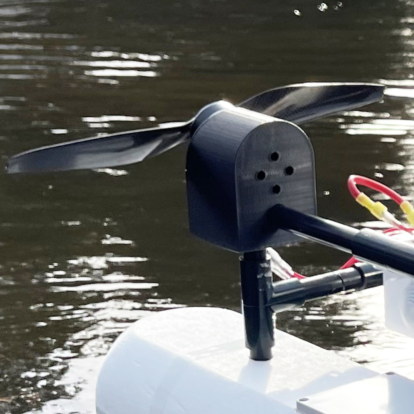 A propeller attached to the boat for the propulsion.